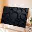 Toile, composition abstraite visuellement saisissante avec art mural chevauchant des cercles noirs de tailles différentes-488501152