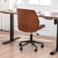 Chaise de bureau rembourrée en similicuir Bryonie-340057850