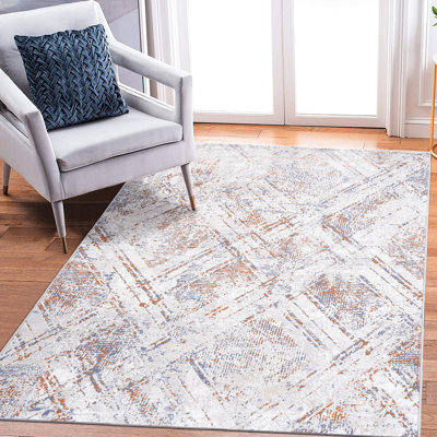 Tapis 5 x 7 taches beige