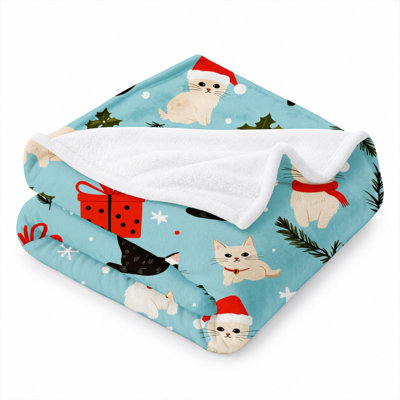 Couverture en flanelle douce à motif de chat de Noël, ultra douce et moelleuse, idéale pour canapé, lit ou fauteuil. Couverture douillette pour les fêtes, parfaite pour les amoureux des chats. Décoration d'hiver et cadeau idéal. Dimensions : 127 x 102 cm. De plus, un sac fourre-tout en toile à motif chat et chapeau de Noël vous est offert.