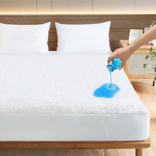 Protège-matelas éponge imperméable et silencieux jusqu'à 12