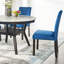 Ensemble de salle à manger 5 pièces Mella - Table ronde en faux marbre avec 4 chaises Parsons en velours bleu, finition espresso foncé-711761015