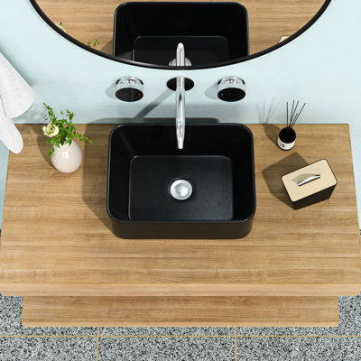 Évier rectangulaire en céramique 16 po x 12 po noir mat. Classique et élégant. Matériau, faible absorption d'eau. Teinture, surface lisse. Fixation au-dessus du comptoir. Trou de drainage 1 3/4 po. Lavabo noir de salle de bain 16 x 12 po.