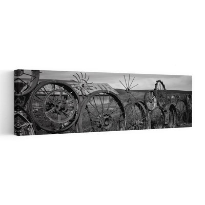 Old Barn With A Fence Made Of Wheels Palouse Whitman County Washington State USA by Dan Merkel - Wrapped Canvas Panoramic Print