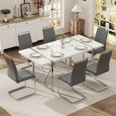 Ensemble de salle à manger 71 "rectangulaire moderne avec base géométrique en métal et chaises en porte-à-faux en similicuir