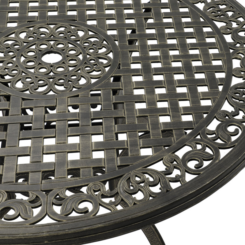 Tsavag 4 - Person Metal Patio Dining Set with Round Table, Brown