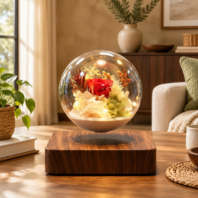 A genuine preserved rose levitates inside this floating LED bulb lamp through magnetic suspension; it is intended as an everlasting-rose gift for kids, lovers, or friends and comes with a Dark Brown Base in 5.5"\*5.5" size, made of Plastic.