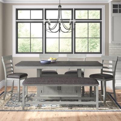 Knauss - Person Extendable Four Leg Dining Set