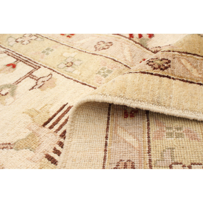 Tapis unique en laine noué à la main ivoire nouvel âge 9 pi 9 po x 14 pi 2 po Chobi