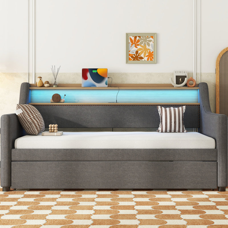 Lit de jour simple gris avec couchette, lin rembourré, DEL vacillante et charge attrayante