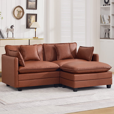 Canapé modulaire rembourré en similicuir avec repose-pieds