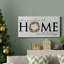 Toile tendue avec châssis de qualité supérieure Home For The Holidays - prête à être accrochée-1636113522