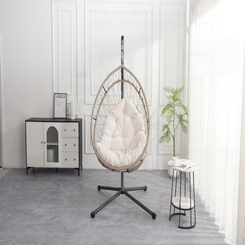 Élégante chaise suspendue d'extérieur en forme d'œuf avec support, parfaite pour la détente et le patio élégant ou à l'intérieur.