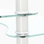Table basse ovale avec plateau en verre et tablette