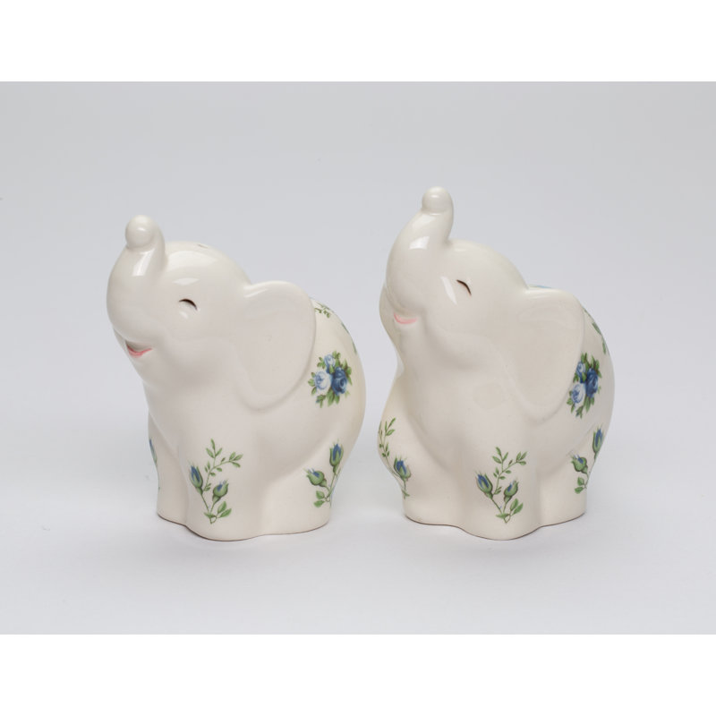 Éléphants avec des roses bleues sel et poivre