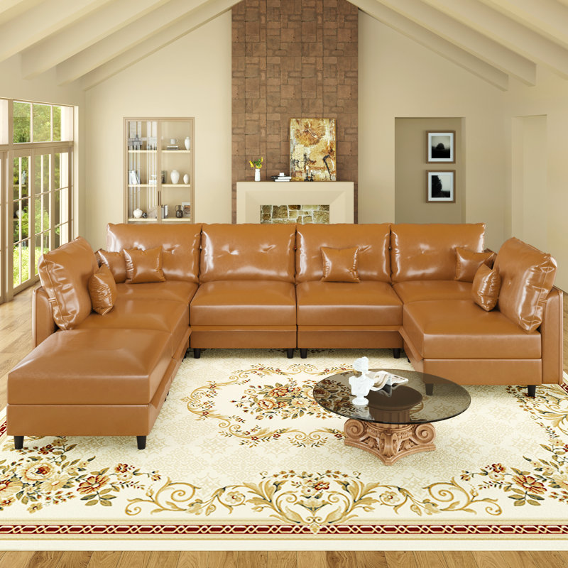 Canapé avec méridienne réversible avec repose-pieds Breseis, Brown Faux Leather