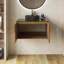 Meuble-lavabo mural en contreplaqué avec comptoir en pierre frittée noire et lavabo et portes ronds en céramique, couleur grain de bois chêne brun