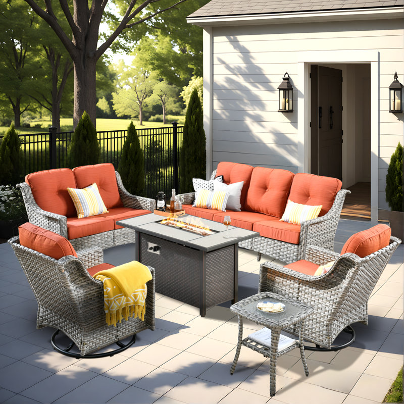 Demariea Outdoor Wicker 7 Person Seating Group With Fire Pit Table With Rocking And Swivel Chairs, Orange