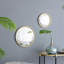 Miroir circulaire avec cadre en fer-547269139