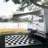 Haylee Super Lightweight Plastic Straw Rug Checkered Black/White Outdoor Area Rug-2096150273