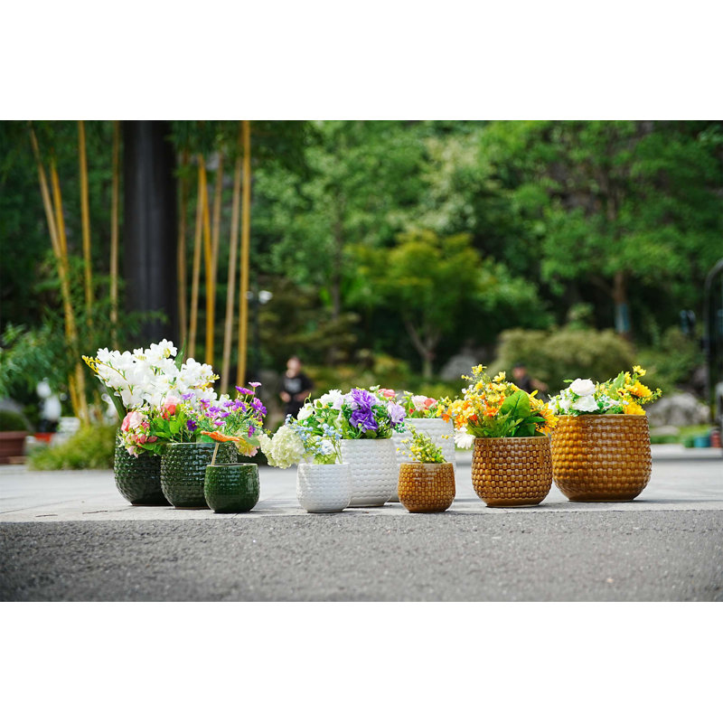Three-piece Set of Ceramic Flowerpots for Patio, Garden or Windowsills with Contemporary Design and Versatile Use