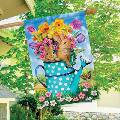 Drapeau de lapin et arrosoir