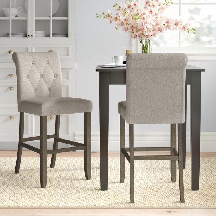 https://assets.wfcdn.com/im/80713791/resize-h755-w755%5Ecompr-r85/1629/162995020/Arsema+Upholstered+Counter+Stool+with+Solid+Wood+Frame.jpg