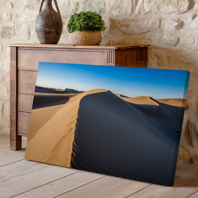 Canvas A Vast Desert Landscape Featuring Rolling Sand Dunes With Smooth Wall Art Undulating Curves Highlighted By The Warm Golden Canvas Wall Art