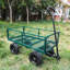 (Green Solid Wheels Wagon) Le chariot de jardin avec outils de roues solides facilite le transport du bois de chauffage-123115712