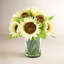 Sunflowers In Glass Vase With Grass-1993210395