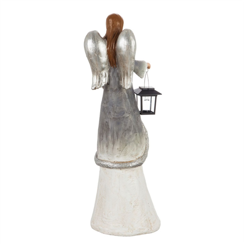 Statue d’ange d’hiver avec lanterne solaire