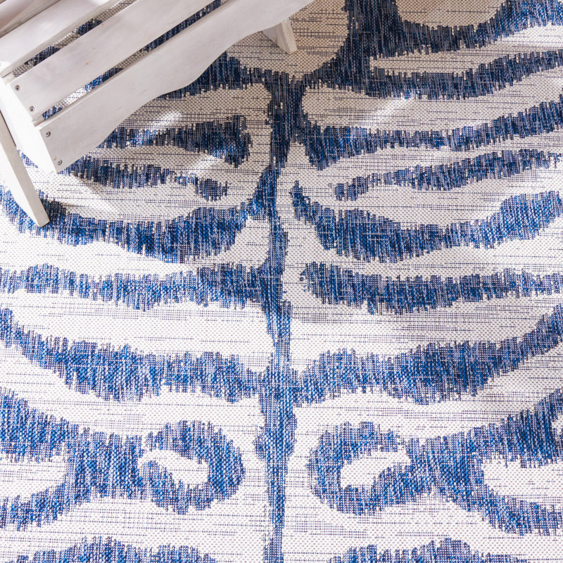 Ivory and Navy Animal Print Indoor/Outdoor Rug