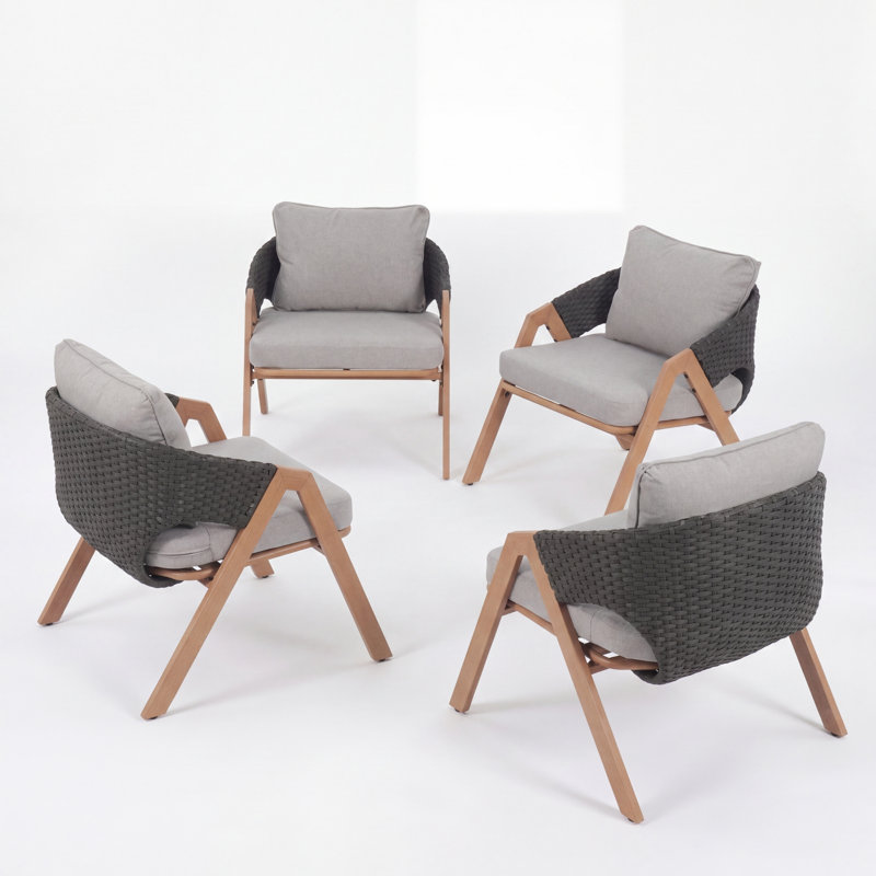 Ensemble de 4 chaises de jardin résistantes aux intempéries, structure en acier, coussins gris, style moderne en rotin.