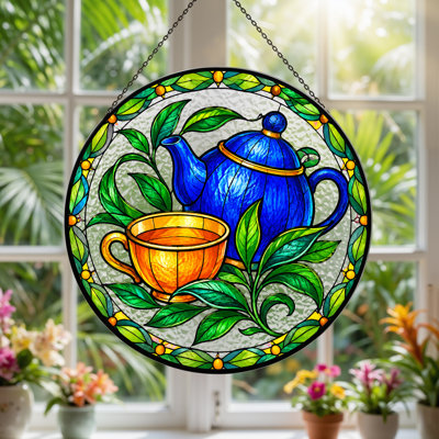 Théière bleue et tasse à thé sur toile de style vitrail
