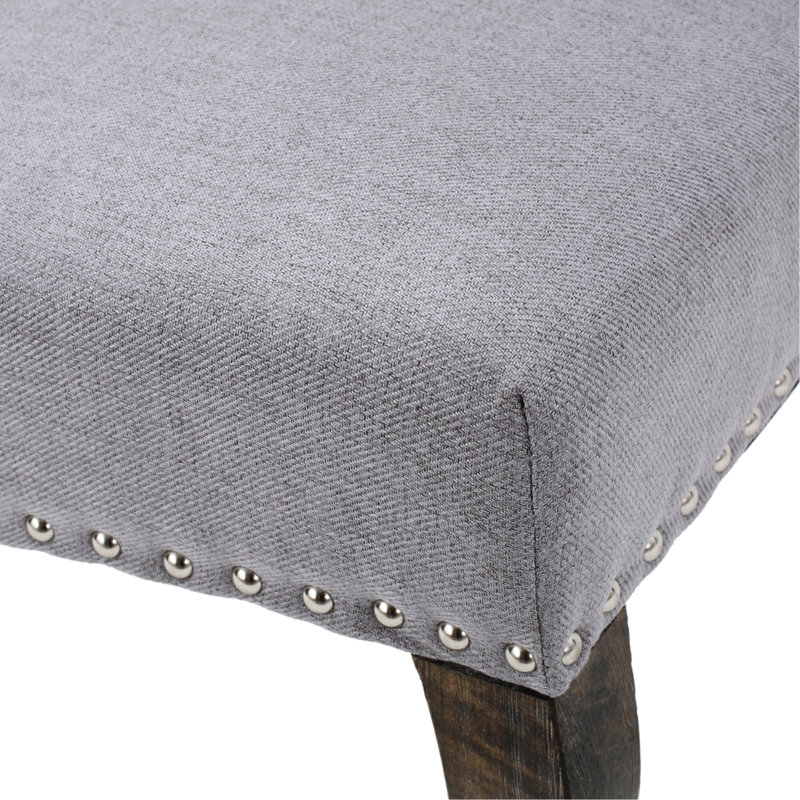 Fauteuil à oreilles haut dossier Kd avec dossier classique et clous élégants, idéal pour les différentes pièces de votre maison