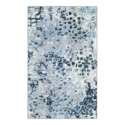 Tapis en polyester tissé à la machine Azion en gris / bleu marine / ivoire
