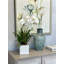 Orchid In White Vase