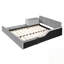 Lit double en velours avec bureau de chevet et petit tabouret rond-398947672-398947675