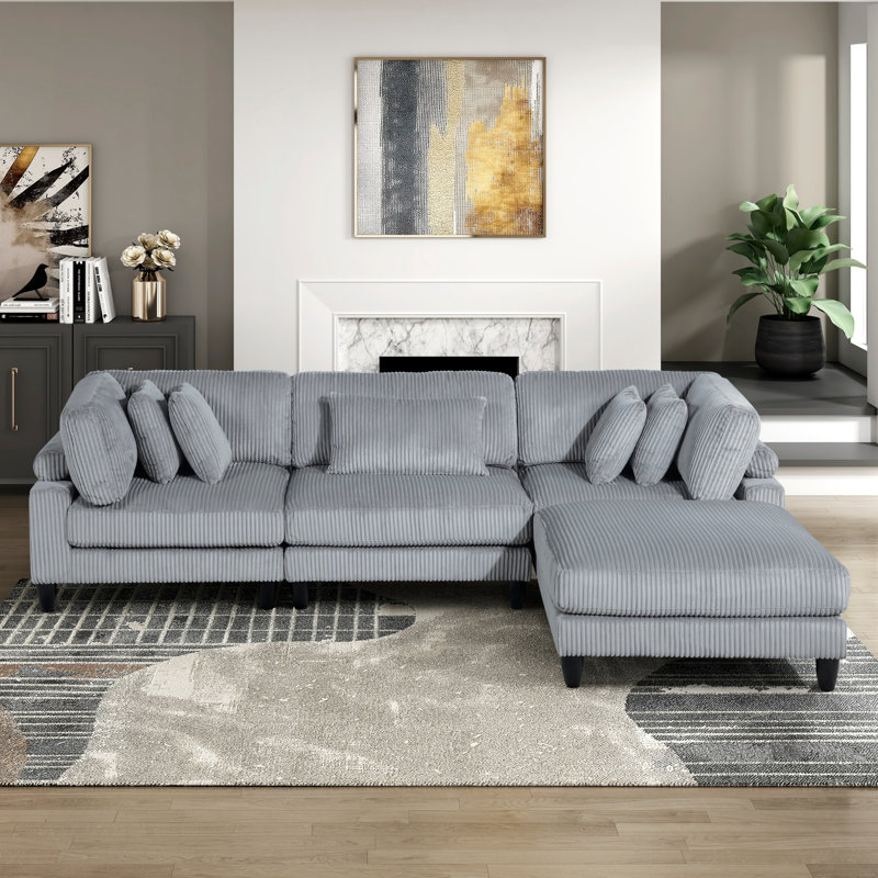Fauteuil d'angle en velours côtelé gris