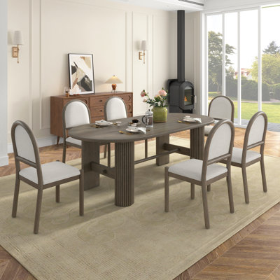 Tavira 7-Piece Oval Rubberwood Dining Set with Upholstered Chairs and Fluted Base