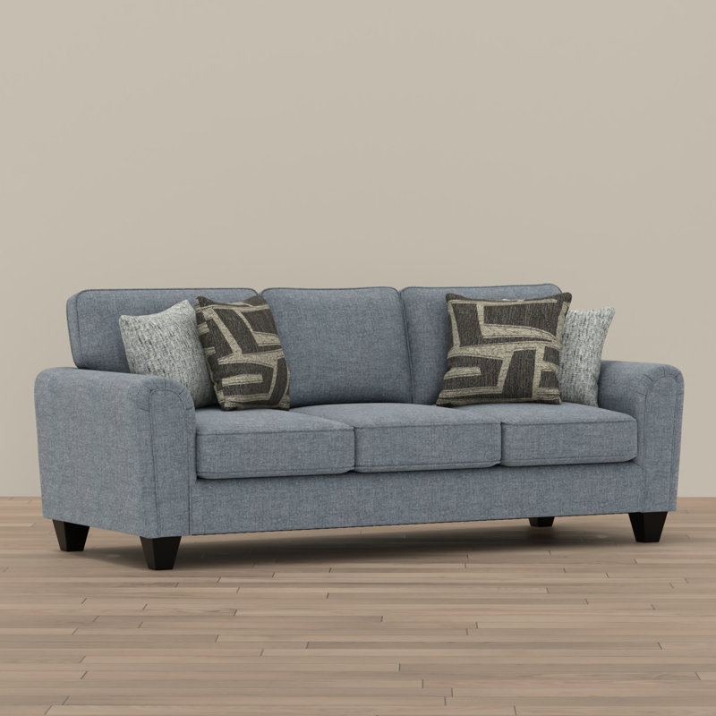 Soft Blue Upholstered Sofa with Pillows