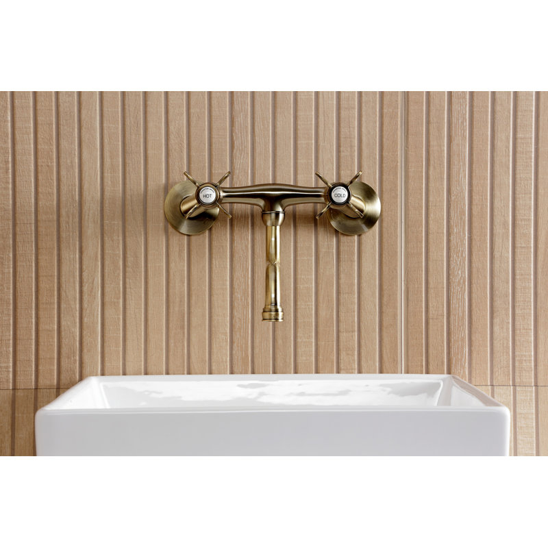 Robinet de salle de bain mural 2 trous Kingston Brass Essex, Laiton antique