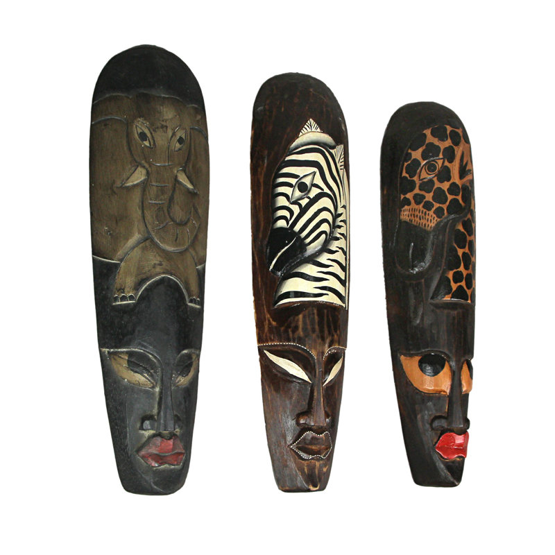 Ensemble de 3 masques muraux en bois brun foncé Albesia, sculptés et peints à la main, de 19 po x 5 po x 2 po.