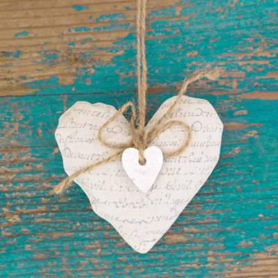 Hanging Heart And Turquoise Wooden Background by Frizzantine - Wrapped Canvas Print