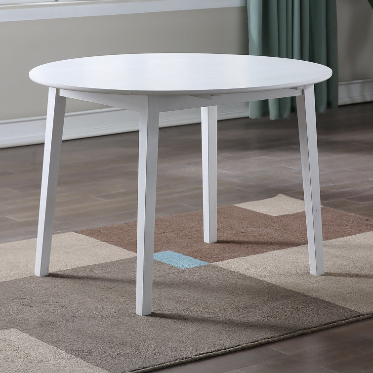 Ankit Extendable Round Solid Wood Base Dining Table