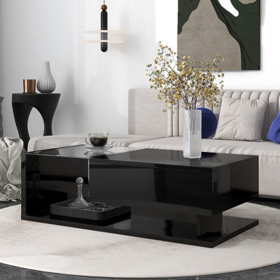 Table basse avec espace de rangement supplémentaire et base contemporaine en bois trempé noir brillant