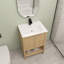Meuble-lavabo autoportant de 24 po avec lavabo en céramique et 2 portes à fermeture douce