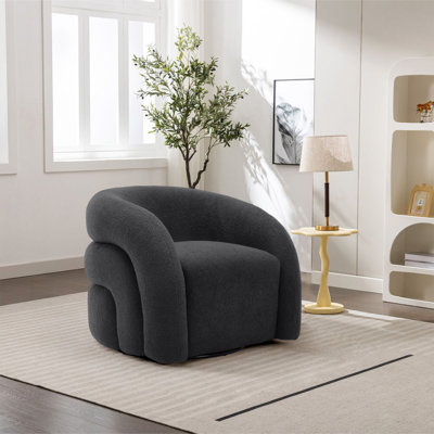 Fauteuil demi-tonneau pivotant rembourré Aunna