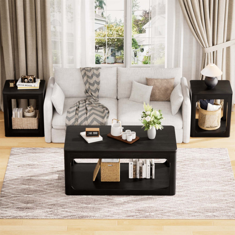 Ensemble de 3 tables basses de salon de style moderne avec beaucoup d'espace de rangement et des bords lisses et arrondis pour une utilisation polyvalente dans n'importe quel espace.