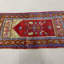 Tapis rouge antique en laine de style turc antique avec aspect rétro, idéal pour les cadeaux